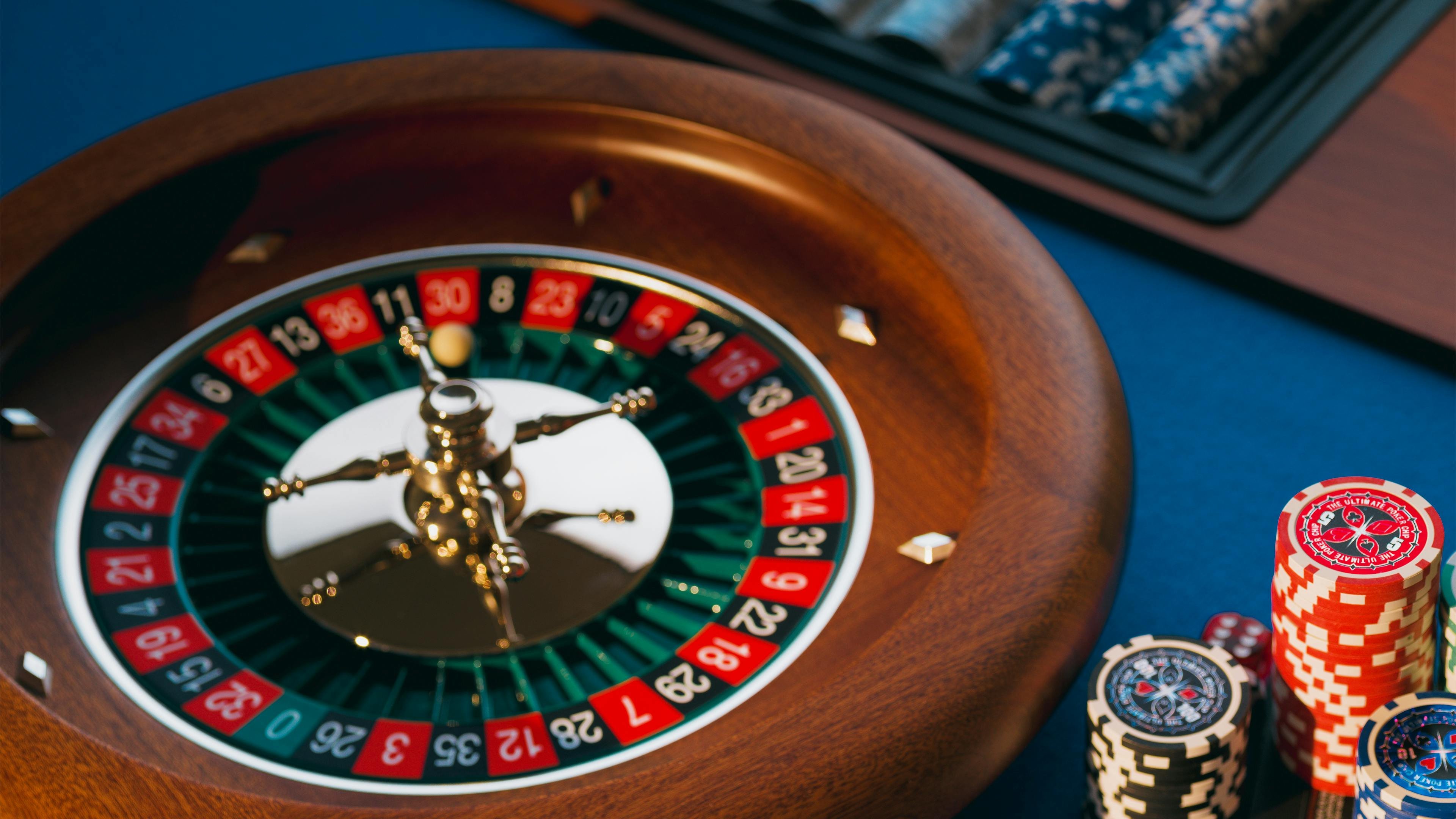 tg7777 casino lobby showing table game categories on screen